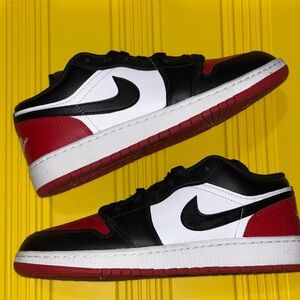 Kids's Jordan’s Black, White, and Red Sneakers 7Y